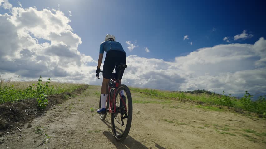 Cyclists adventure on gravel roads Royalty-Free Stock Footage #1098567729