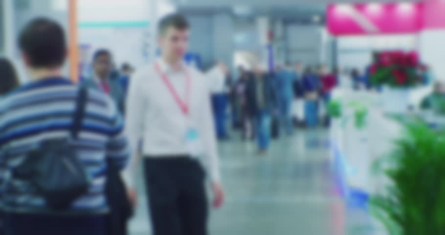 timelapse.blurred silhouettes of unrecognizable people who move quickly inside the building.