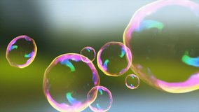 Abstract transparent soap bubbles flying up bright iridescent beautiful festive on the background of nature. Abstract background. Video in high quality 4k, motion design - Powered by Shutterstock - Get 15% off with code: PIKWIZARD15