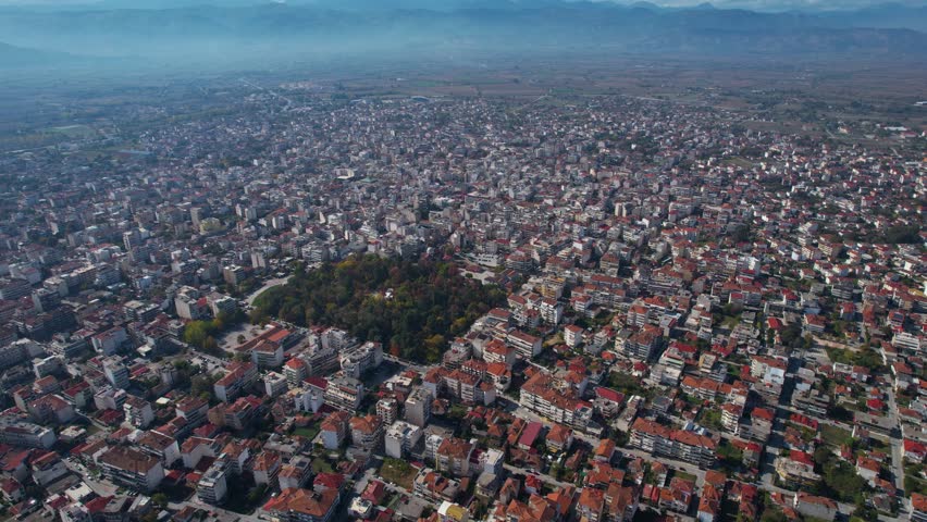 Aerial view of the city Karditsa in Greece on a cloudy day in afternoon