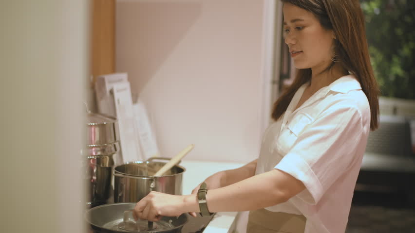 Shopping concept of 4k Resolution. Asian women is buying kitchen utensils in department stores. | Shutterstock HD Video #1098593459