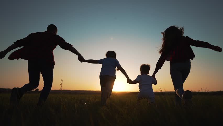 People in park silhouette. Happy family holding hands together in nature. Happy children with father walk. Family running together in park holding hands. Father playing with children outdoors Royalty-Free Stock Footage #1098596997