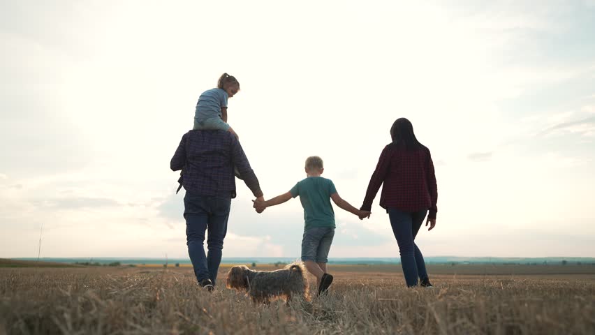 People travel in park.Happy family walk in field in nature. happy family active lifestyle. Summer walk in park at sunset. Parents and children. Happy children of family. Summer travel go everywhere. | Shutterstock HD Video #1098597011