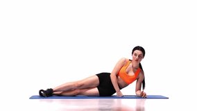 Young sportive girl lying on mat and training over white studio background. Side plank. Toned body. Modern sport, action, motion, youth concept. Fitness, hobby, healthy lifestyle