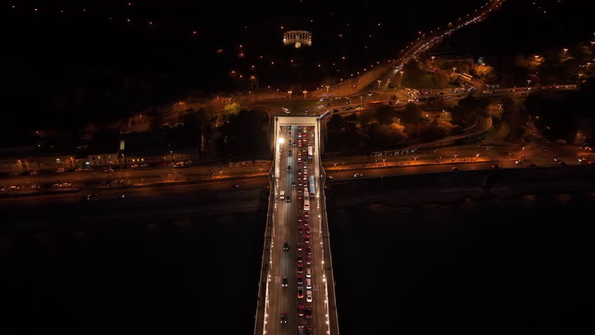 Aerial night view of Budapest Elisabeth Bridge, the third newest bridge of Budapest, Hungary, connecting Buda and Pest across the River Danube | Shutterstock HD Video #1098601929