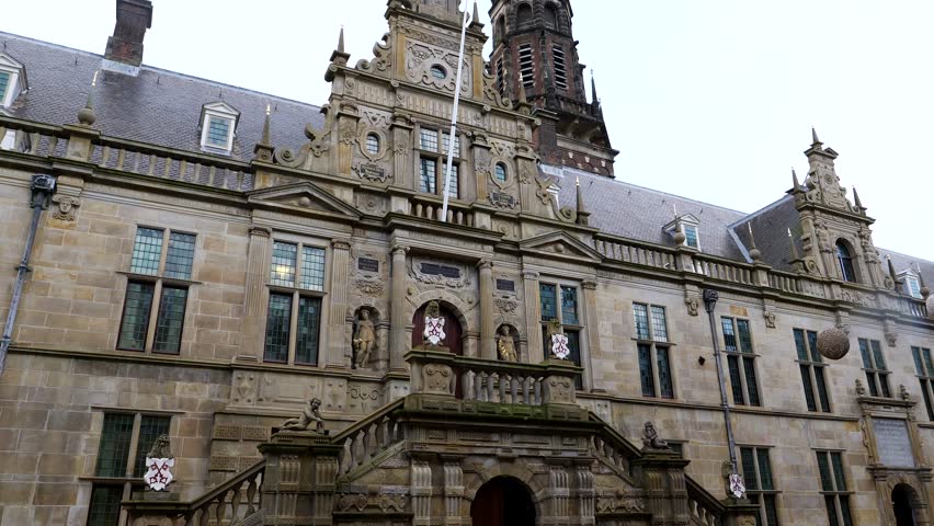 Tilt up shot of old dutch Stadhuis City Hall building in Leiden City during sunny day