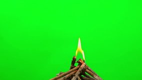 Fire camping concept, fire flame burn glowing on green screen background, beautiful flame slow motion glow up on green wallper for creatvie design video graphic of chroma key, yellow red flame fire