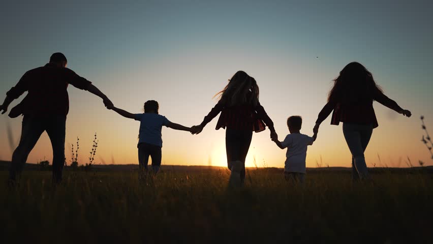 People in park silhouette. Happy family holding hands together in nature. Happy children with father walk. Family running together in park holding hands. Father playing with children outdoors Royalty-Free Stock Footage #1098632703