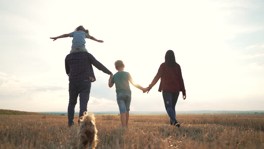 People travel in park.Happy family walk in field in nature. happy family active lifestyle. Summer walk in park at sunset. Parents and children. Happy children of family. Summer travel go everywhere. | Shutterstock HD Video #1098632719