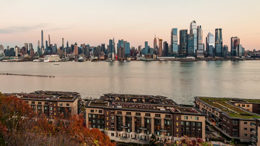 New York City urban buildings over Hudson River timelapsing view Royalty-Free Stock Footage #1098636459
