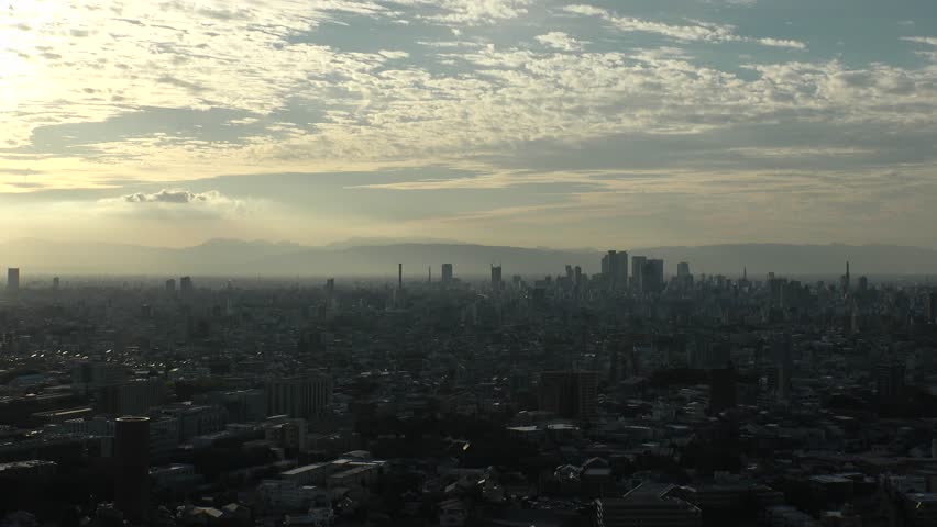 NAGOYA, JAPAN : NAGOYA CITY in sunset. Aerial view of buildings and street traffic around Nagoya station and Sakae area (central downtown). Time lapse shot, dusk to night. Travel and tourism concept.