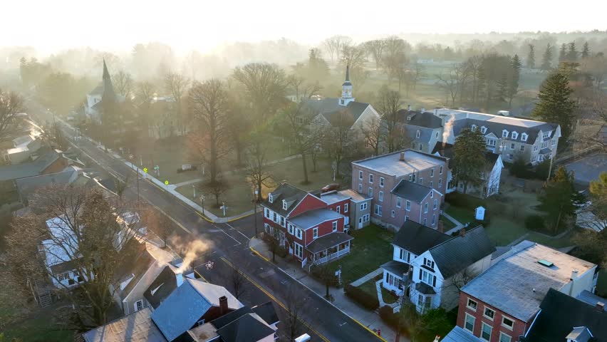 Linden Hall and Moravian Church in Lititz Pennsylvania USA. Aerial pullback reveal in winter.