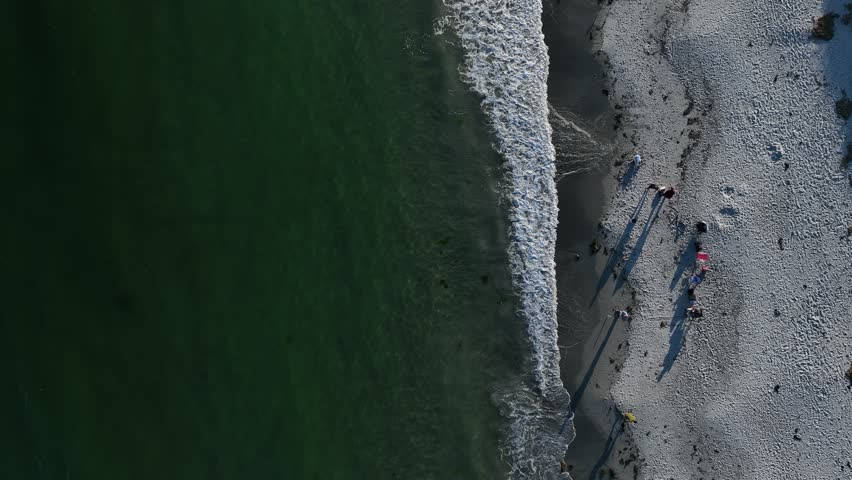 People enjoying their summer on Pine Point Beach Topdown Aerial View