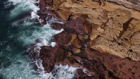 Drone shot of Waves crash on rocks. Ocean and sea stock videos