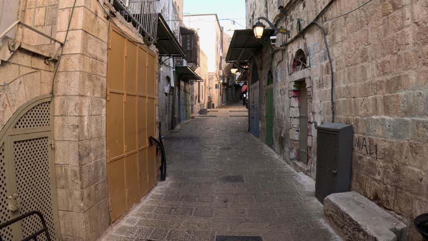 Walking down the street in the old town of Jerusalem, Israel