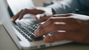 Guy hands typing keyboard laptop at apartment closeup. Brown skin man arms pressing computer buttons at home office macro view. Freelancer fingers working using modern device at remote workplace - Powered by Shutterstock - Get 15% off with code: PIKWIZARD15