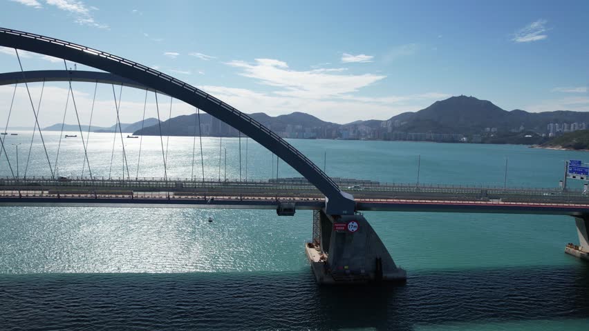 Large-scale sea traffic viaduct bridge Cross Bay Link landmark at sea in Lohas Park,Tseung Kwan O of Hong Kong city, Kowloon Kai Tak Aerial Top view Royalty-Free Stock Footage #1098674695