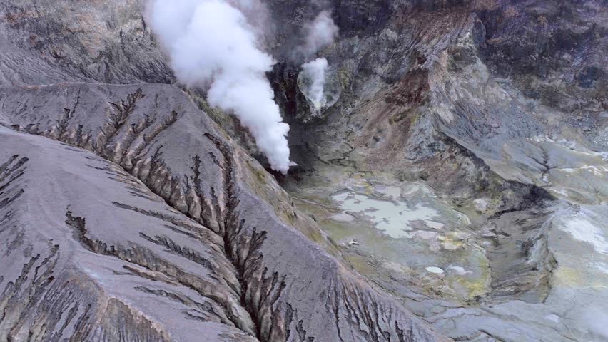 Aerial view of Whakaari White Island volcano crater in New Zealand Royalty-Free Stock Footage #1098682075