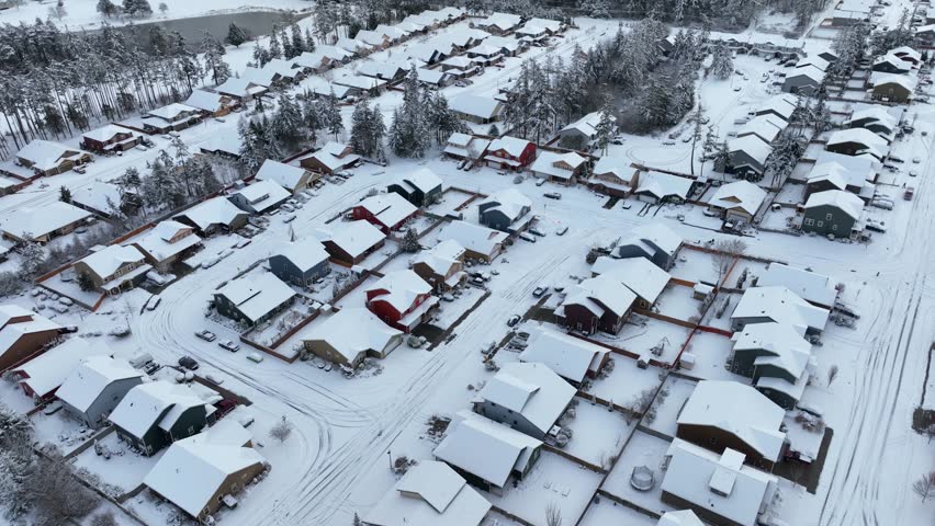 A suburban neighborhood in Washington State covered in snow.