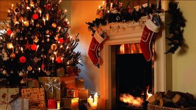 Christmas beautiful video with animated fireplace, Xmas tree with garland, pleasant atmosphere and luminous fire. Best use for Xmas gifts and titles with a greeting inscription.