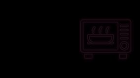 Glowing neon line Microwave oven icon isolated on black background. Home appliances icon. 4K Video motion graphic animation.