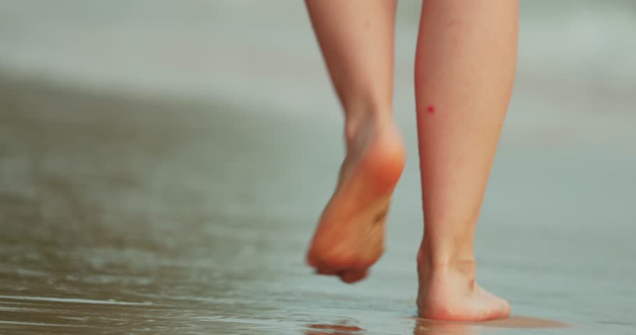 The girl is walking on a sand beach in Phu Quoc Island, Vietnam | Shutterstock HD Video #1098695925
