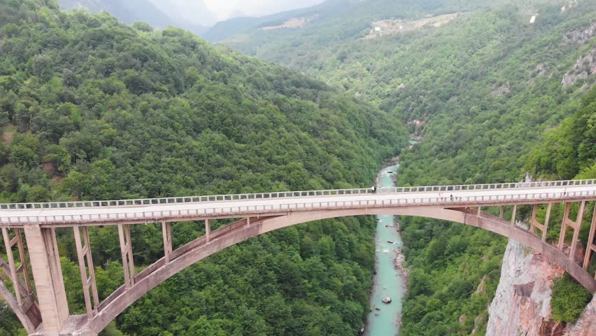 Aerial of Djurdjevica Bridge over Tara river canyon in Montenegro. Grerat tourist attraction and unique architectural structure