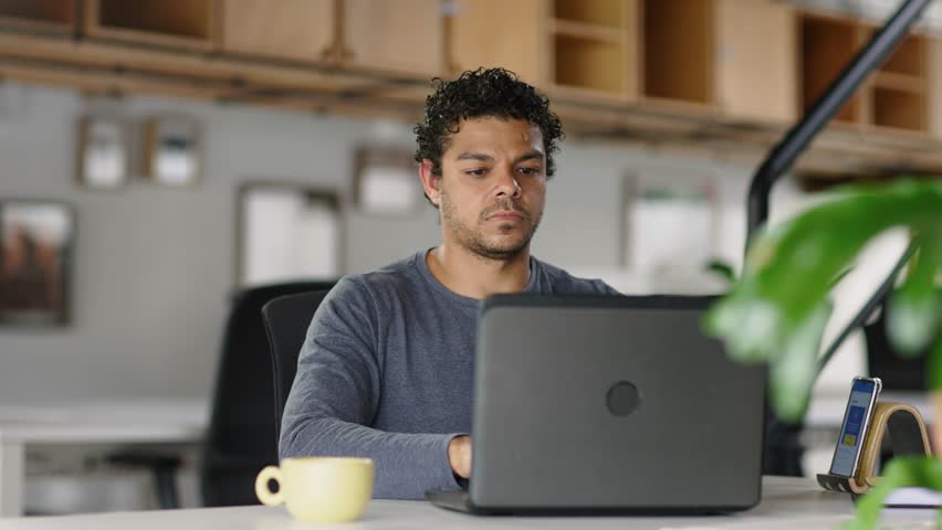 Shocked frustrated mixed race business man student feel stressed look at computer screen worried of problem read bad online news receive failed exam results concept sit at home office table
 Royalty-Free Stock Footage #1098715505