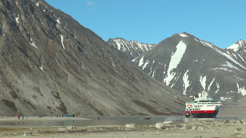 Arctic Expedtion Ship. Cruise ship near coast of Svalbard. Long shot of Arctic Expedtion Ship Spitsbergen Norway