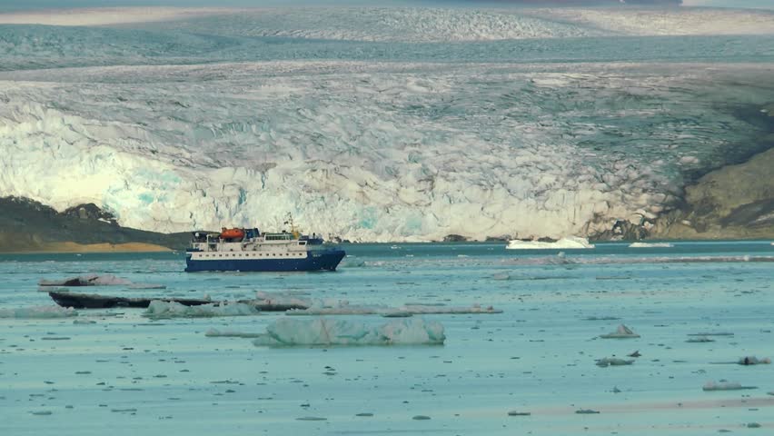 Arctic Expedtion Ship. Cruise ship near coast of Svalbard. Long shot of Arctic Expedtion Ship Spitsbergen Norway