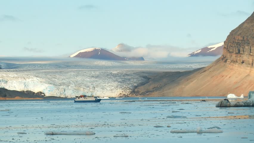 Arctic Expedtion Ship. Cruise ship near coast of Svalbard. Long shot of Arctic Expedtion Ship Spitsbergen Norway