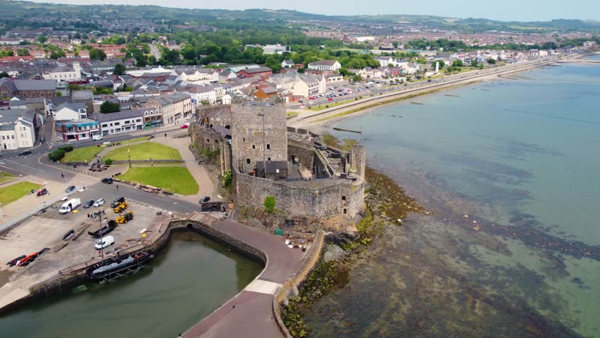 Aerial video of Carrickfergus Castle  where King William of Orange landed in 1690 Co Antrim Northern Ireland
