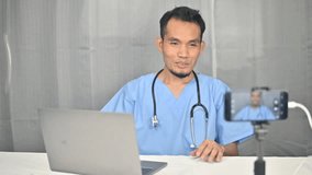 Doctor telemedicine online consult healthcare. doctor talking to online patient on laptop screen sitting at clinic office desk giving online consultation for domestic health treatment. Telemedicine 