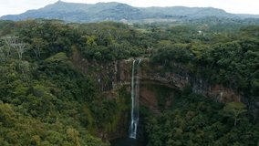 Aerial drone video of tropical forest and Chamarel Waterfall in Mauritius, Black River