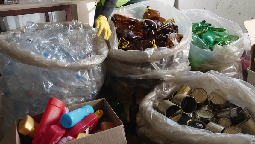 Waste Disposal and Recycling Center. From curbside to finished sorted materials, ready to be reused. Glass plastic cardboard metal | Shutterstock HD Video #1098753091