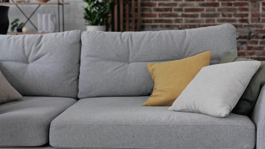 Exhausted overloaded man came home after work flopped down on couch feels like squeezed lemon. Concept of after party, tired overworked person hard day, lack of energy, breakdown. Tired lazy guy | Shutterstock HD Video #1098753799