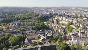 Inscription on video. Luxembourg, Historical city center in the morning. Different colors letters appears behind small squares, Aerial View