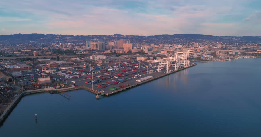 Aerial: Oakland Container Ship Port And Oakland City Skyline, California, USA
