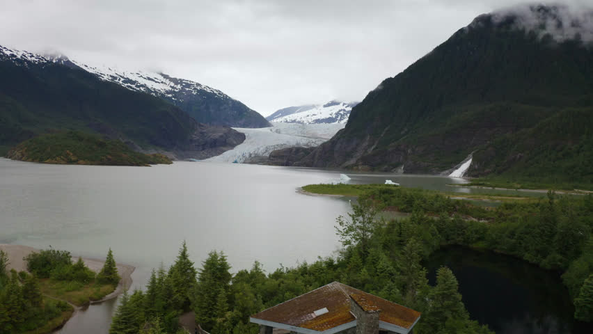 Cinematic aerial view of Mendenhall Glacier in Juneau, Alaska Royalty-Free Stock Footage #1098756355