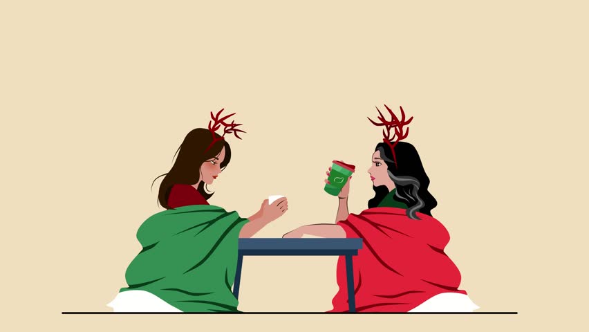 Two ladies sitting by the table drinking coffee