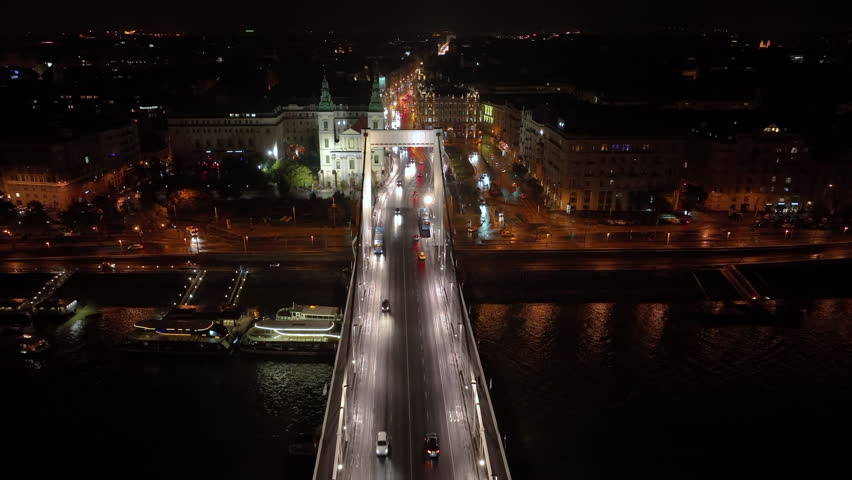 Budapest Elisabeth Bridge, the third newest bridge of Budapest, Hungary, connecting Buda and Pest across the River Danube. Aerial view at night, the largest city in Hungary | Shutterstock HD Video #1098785541