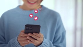 Happy woman enjoy fun chat typing on smart phone relax watch live video and post button love heart emoji icon, Social media, social network concept - Powered by Shutterstock - Get 15% off with code: PIKWIZARD15