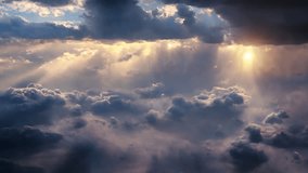 An aerial shot above beautiful cloudscape with sun rays coming through the clouds, detailed picturesque view, camera flying to the storm rainy clouds with dense fog, CG animation.