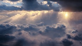 An aerial shot above beautiful cloudscape with sun rays coming through the clouds, detailed picturesque view, camera flying to the storm rainy clouds with dense fog, CG animation.