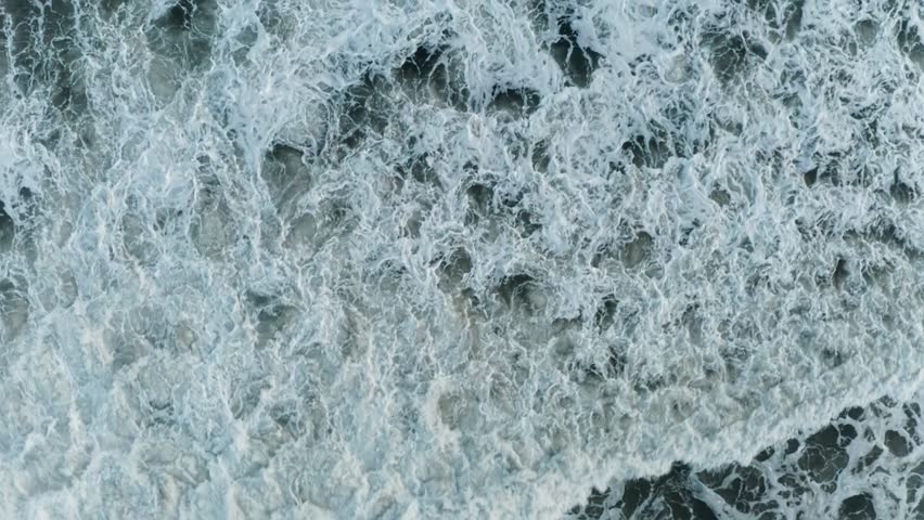 Waves in the ocean with foam view from above | Shutterstock HD Video #1098797057