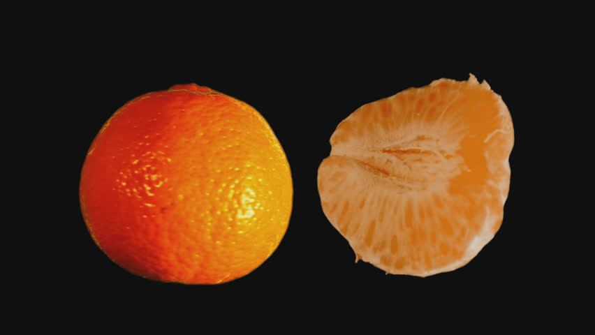 Tangerine on transparent background (with alpha channel) side view of whole  fruit, rotating on black background . Amazing natural texture of vibrant citrus  - Powered by Shutterstock - Get 15% off with code: PIKWIZARD15
