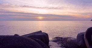 Time lapse of Majestic sunset light over sea landscape,Amazing light of nature cloudscape sky and Clouds moving away rolling, Colorful sunset or sunrise light dramatic clouds