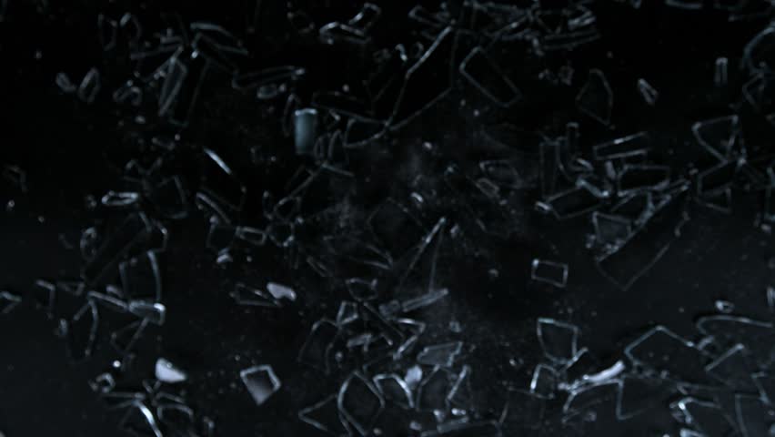 Super Slow Motion Shot of Shattering Glass Shards Flying Towards Camera on Black at 1000fps. Royalty-Free Stock Footage #1098810231