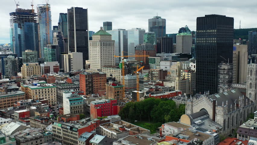 Aerial pan of the Montreal, Quebec, Canada in summer 4K