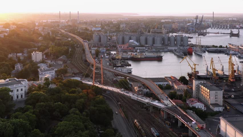 Aerial view of Odessa sea port infrastructure and evening sunset. Urban city scape.